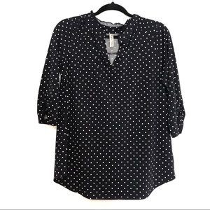 Long sleeve ruffle neck navy polka dot blouse